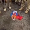 Добровольцы из Грузии на фоне уничтоженной "Мрии" сожгли флаг РФ
