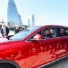 Ильхам Алиев за рулем подаренного ему турецкого электромобиля Togg